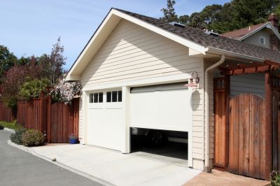 Protect Your Valuables and Vehicles From The Weather By Installing a Garage Roof